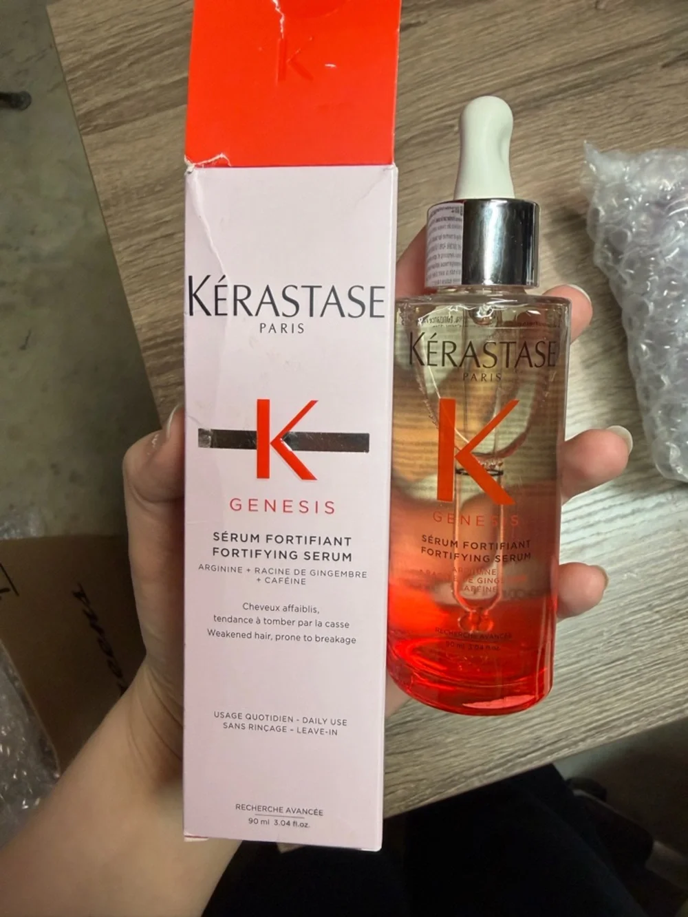 Kérastase Genesis Fortifying Serum - Red/Orange Gradient Bottle
